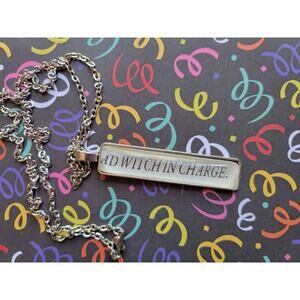 Witch in Charge pendant necklace made from The Kiss Curse book pages